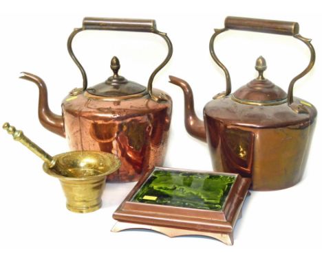 Two copper kettles with acorn finials, brass pestle and mortar and copper tea pot stand with green inset tile Condition repor
