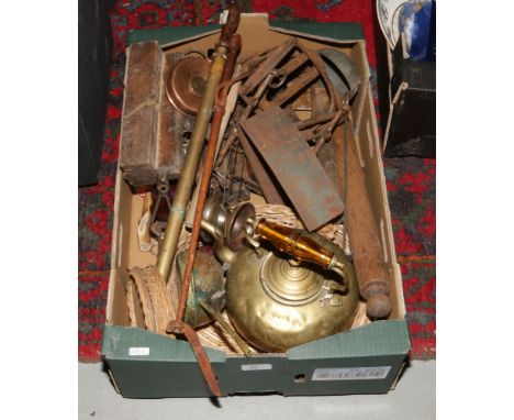 A box of metalwares, vintage tools, rebate planes, garden sprayer, Equestrian stirrups and bit, brass kettle etc.