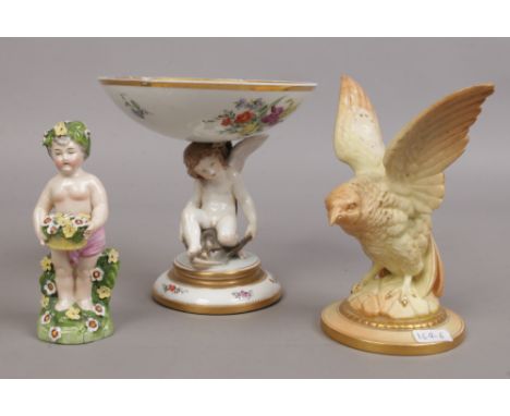 A Copenhagen porcelain tazza the support formed as a cherub on a dolphin, along with a Royal Worcester urn lid formed as an e