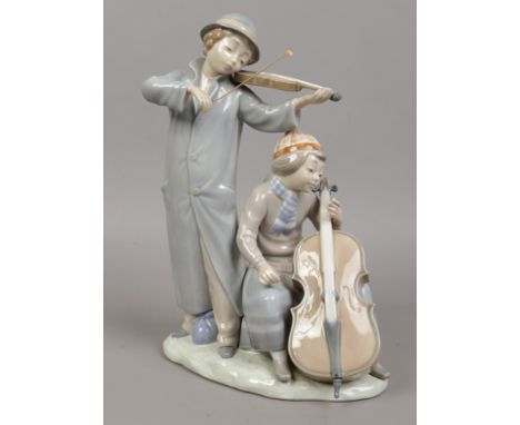 A large Nao figure of a violin and cello player.