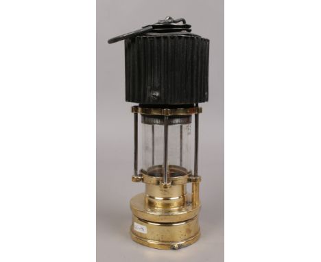 A Patterson type HCP miners lamp with corrugated bonnet.