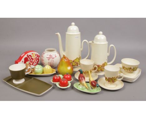 A collection of Carltonware to include novelty cruets, coffee set, money bank etc.