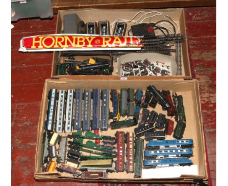 A large quantity of Triang and Hornby 00 gauge model railway, track, various engines, rolling stock, coaches, signals and pow