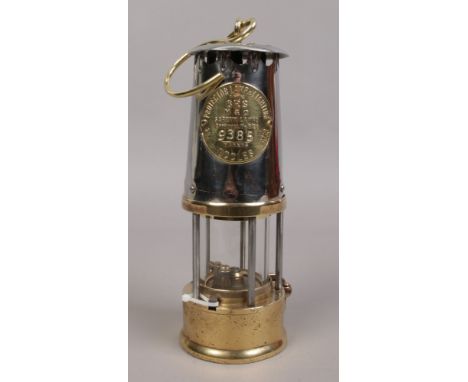 An Eccles type 6RS chrome and brass miners re-lightable protector lamp.
