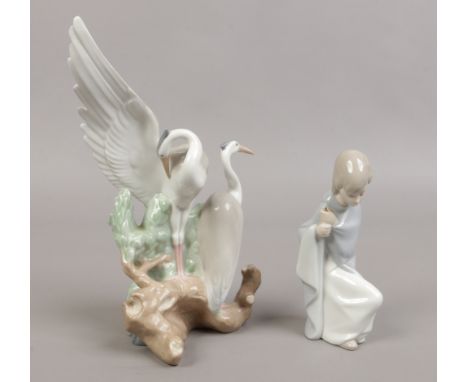 A Nao figure group of herons, along with a Lladro figure of a young Saint Joseph (missing staff)