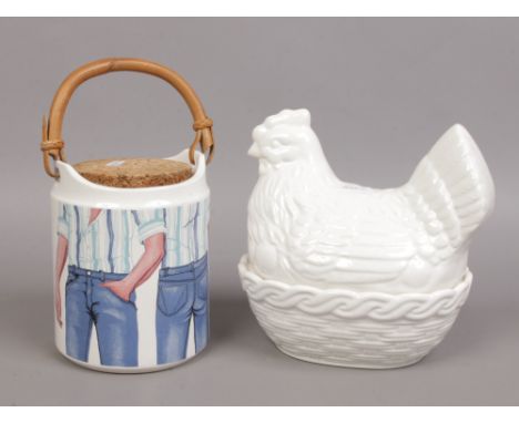 A Carltonware Jeans biscuit barrel and a white glazed pottery chicken formed egg basket.