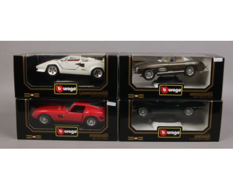 Four boxed Burago 1/18 scale Diecast metal model cars including Mercedes, Ferrari, Lamborghini and Jaguar.