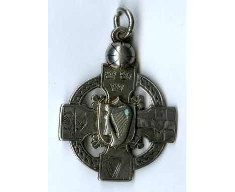 1905 G.A.A. Challenge MatchMedal: G.A.A., 1905  An attractive and unusual cross shaped and pierced silver Medal, the obverse 