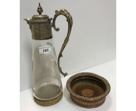 A Victorian cut glass claret jug with plated mounts, the main body decorated with monkeys amongst coconut trees and foliage, 