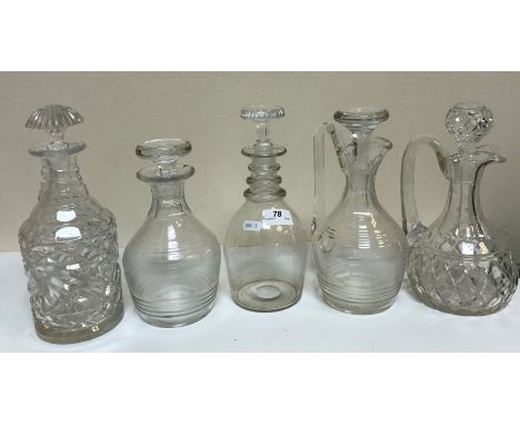 A collection of assorted glassware to include various decanters, drinking glasses, an illusion glass, etc., together with a p