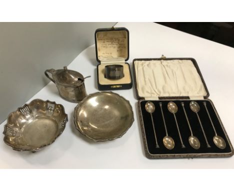 A collection of silver wares comprising oval lidded mustard (by Goldsmiths &amp; Silversmiths Company Limited, Sheffield 1923