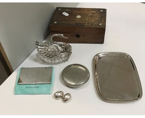 A collection of items mainly relating to Tiffany &amp; Co., comprising a Tiffany &amp; Co. navy leather photograph frame, 28.