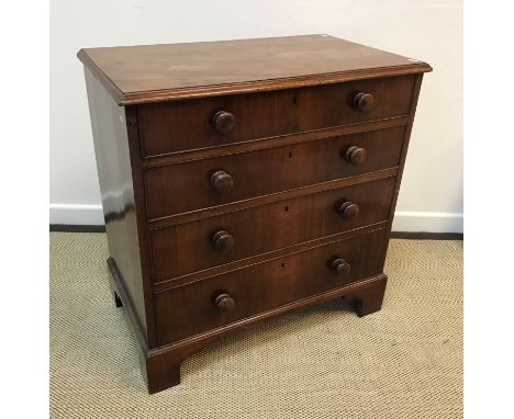 A 19th Century mahogany chest, the plain top with applied moulded edge, over four long graduated drawers with turned knob han