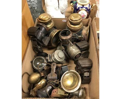 A collection of various vehicle lamps including a pair of GPO brass and black painted lamps, a Miller's rear cycle lamp, a De