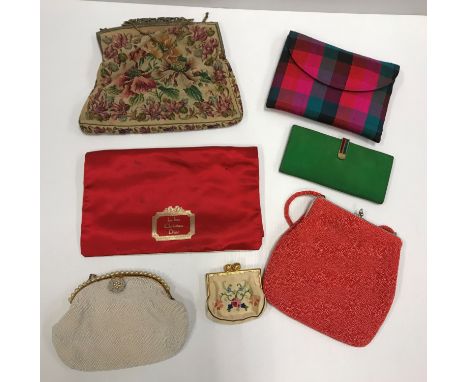 A collection of evening bags to include two beaded examples and an Austrian tapestry example together with a Christian Dior s