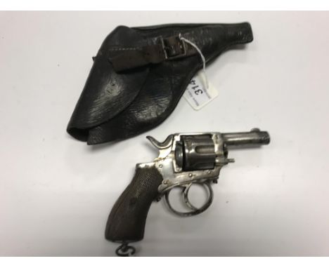 A Belgian 32 calibre pistol, bearing mark to body "R" with crown above, housed in a leather holster CONDITION REPORTS No cert