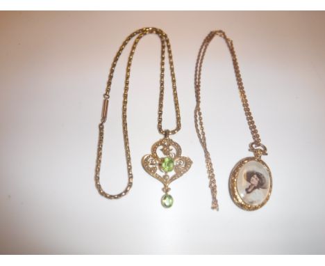 A 9 carat gold seed pearl and peridot set pendant in the Art Nouveau manner with 9 carat gold chain, 11.7 g, together with a 