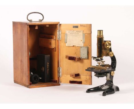 An Ernst Leitz Vetzlar brass monocular microscope, early 20th century, No. 198758, together with various lenses and accessori