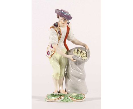 A Samson porcelain figure of a seed sower, 19th century, gold anchor mark to the base, h.21cm