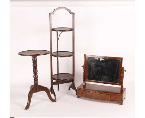 A mahogany swing framed mirror, 19th century, having three drawers to the base, h.45cm, together with an oak three tier cake 