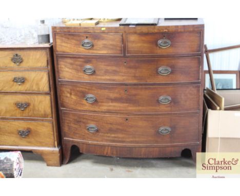 A 19th Century mahogany bow front chest fitted two short over three long drawers`