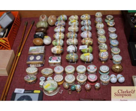 A large quantity of enamel boxes and stone eggs