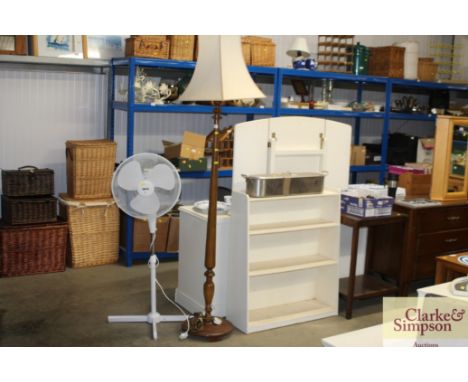A mahogany standard lamp and shade