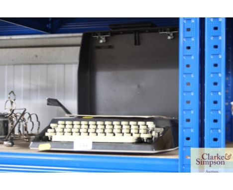 A typewriter in fitted case