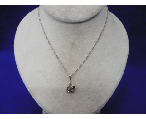 9ct GOLD AND RUBY PENDANT ON CHAIN