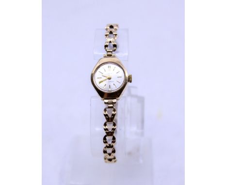 Ladies Vintage 9ct Gold Prexa 17 Jewels Watch with 9ct Gold Watch Bracelet The watch face width measures approx. 18mm includi