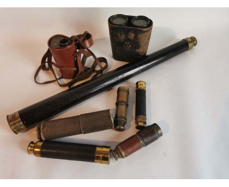 A collection of various antique brass telescopes together with a pair of binoculars and a Carl Zeiss Monocular. (1)