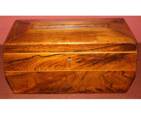 A Regency rosewood sarcophagus shaped tea caddy, fitted interior, twin handles, 17cm high x 30cm wide and 15cm deep