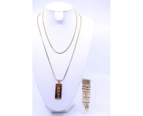 Selection of 9ct Gold Jewellery.  To include; a 9ct Gold Gate Bracelet, a 9ct Gold Ingot Pendant, a fine 9ct Gold Curb Link A