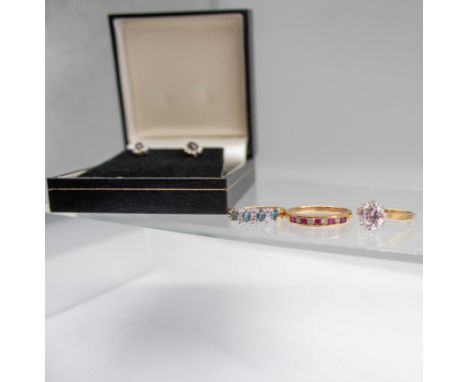 Three 9ct Gold Rings and a pair of 9ct Gold Sapphire and Diamond Cluster Earrings  One of the rings is a 9ct Gold Nine Stone 