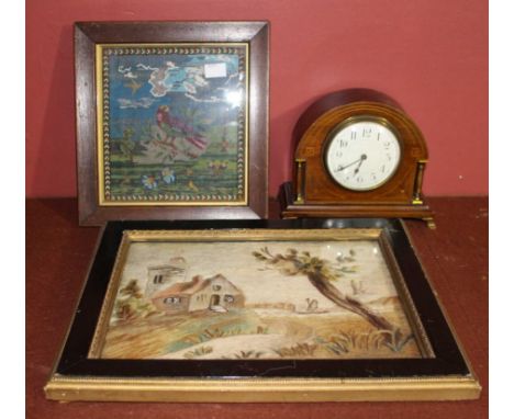 An early 19th century silk picture of a boat on an estuary by a rustic building 20 x 38cm, a Victorian beadwork picture of a 
