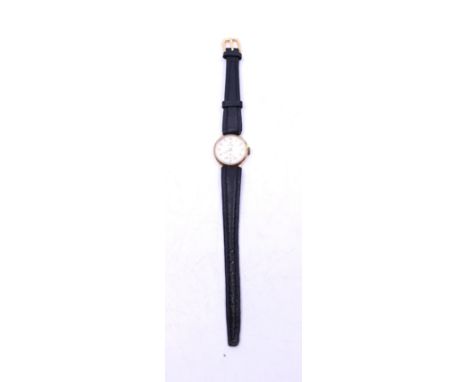 Ladies Vintage 9ct Gold Cyma Swiss Watch with black leather strap  The round watch face measures approx. 22mm including the w