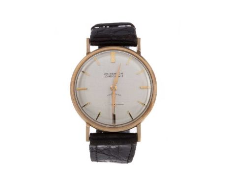 GENTLEMAN'S NINE CARAT GOLD CASED MANUAL WIND WRIST WATCH,the dial signed 'J.W. BENSON, LONDON, N.W.1', 33mm case with person