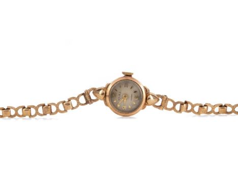 LADY'S MAJEX NINE CARAT GOLD MANUAL WIND WRIST WATCH,the round cream dial with applied baton and Arabic hour markers, 15mm ca