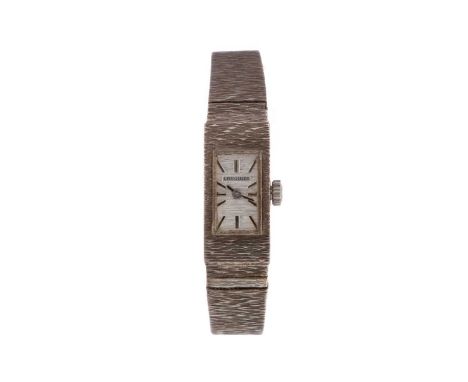 LADY'S LONGINES SILVER MANUAL WIND WRIST WATCH,the rectangular dial with applied baton hour markers, 11mm case, on a bark eff