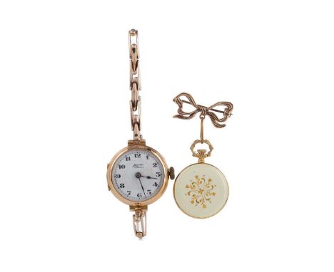 LADY'S NINE CARAT GOLD CASED MANUAL WIND WRIST WATCH,the round white enamel dial signed 'HARDY'S, ABERDEEN', with Arabic hour