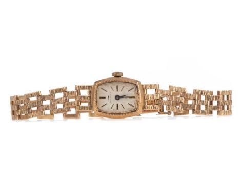 LADY'S JAQUET-DROZ NINE CARAT GOLD MANUAL WIND WRIST WATCH,the rectangular textured dial with applied baton hour markers, 14m