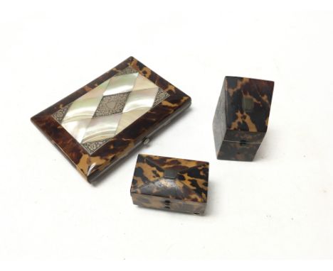 A tortoise shell cigarette case with tortoise shell thimbal case & tortoise shell trinket box