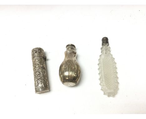 A collection of 3 silver perfume bottles. Inc cut glass.