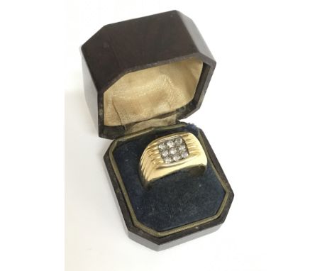 An 18ct gold signet ring set with diamonds , weight 15.2g size T/U