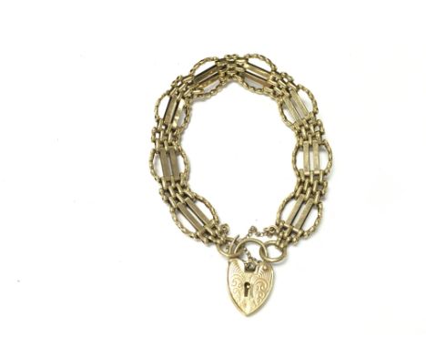 A 9ct gold gate bracelet. Approx 6.5cm diameter and 19.82g.Postage B