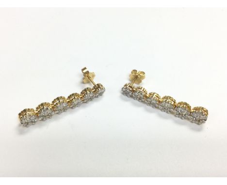 A pair of 18ct gold earrings set with round brilliant cut diamond drop earrings, approx 7.7g. Colour F/G, good clarity. Shipp