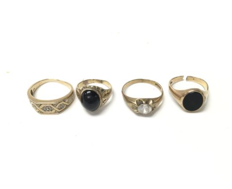 Four 9ct gold rings set with various stones including diamond. Total weight 15.4g Postage A