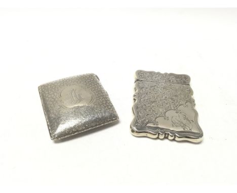 A silver card case with a silver cigarette case.