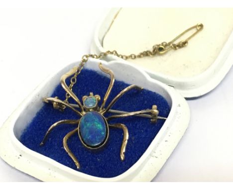 A 9ct gold opal spider brooch, 3,6g. Postage category A