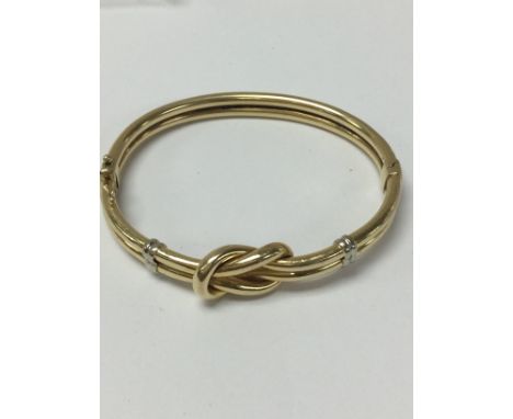 A 15 ct gold bangle total weight 17.6 grams